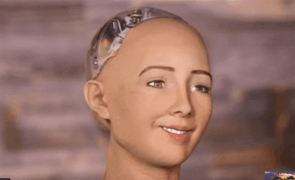 A gif of a confused robot making weird expressions.